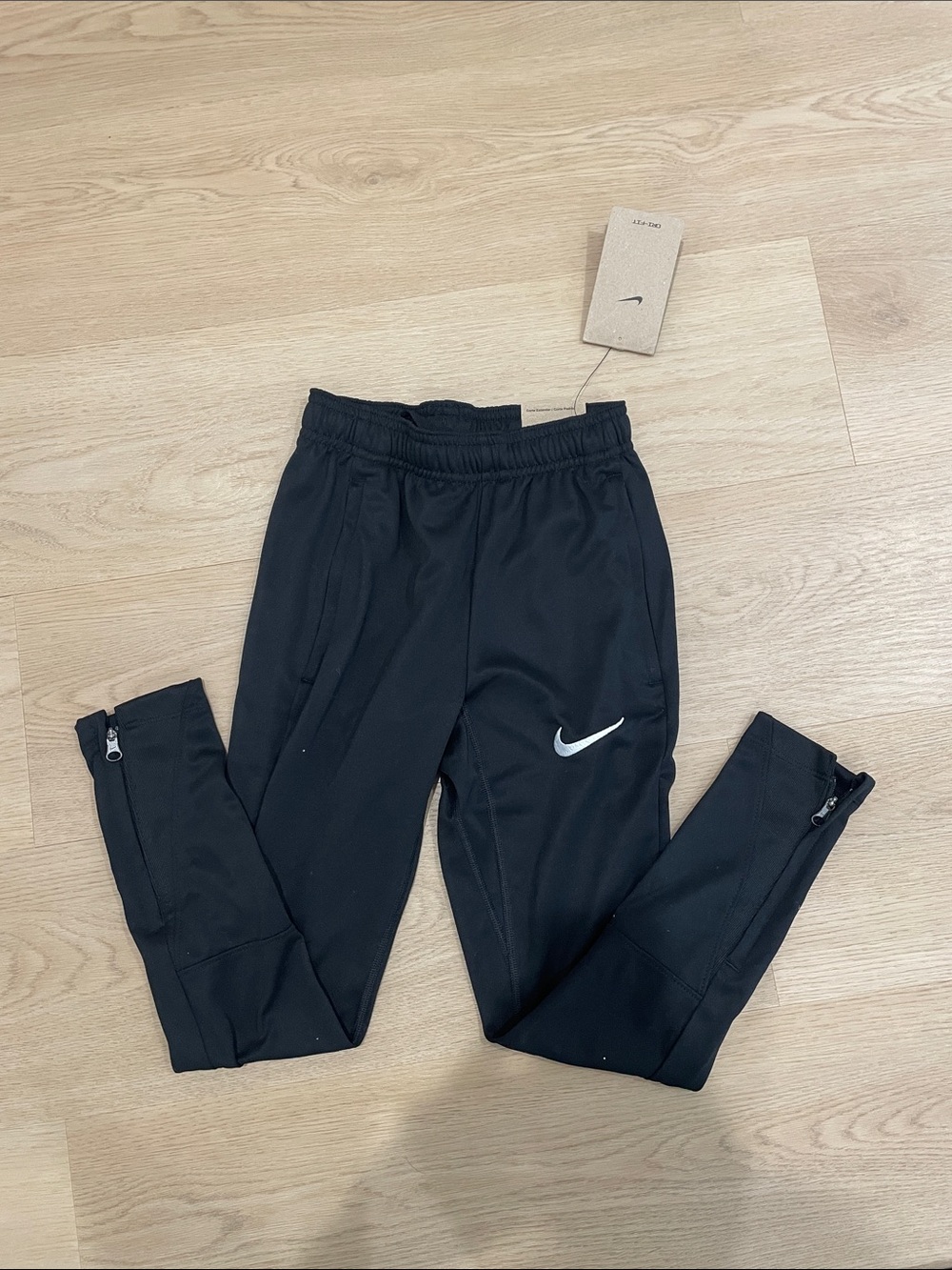 Nike Kids Black Jogger Sweatpants with White Swoosh